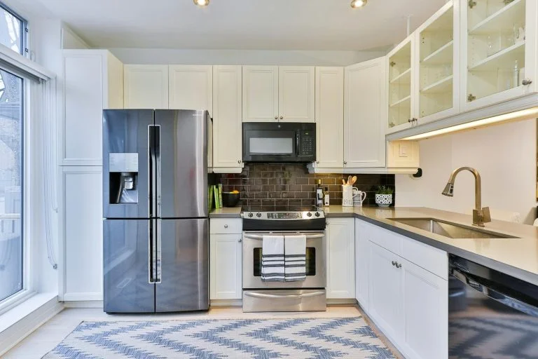 Just an image of a kitchen with electrical appliances in sight, to show common appliance problems they can face.